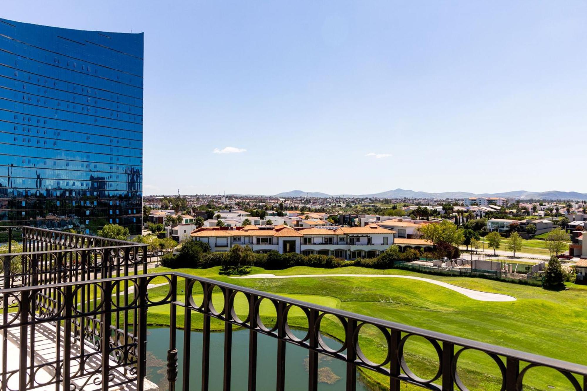Отель Camino Real Puebla Angelopolis Экстерьер фото View of the golf course from the hotel