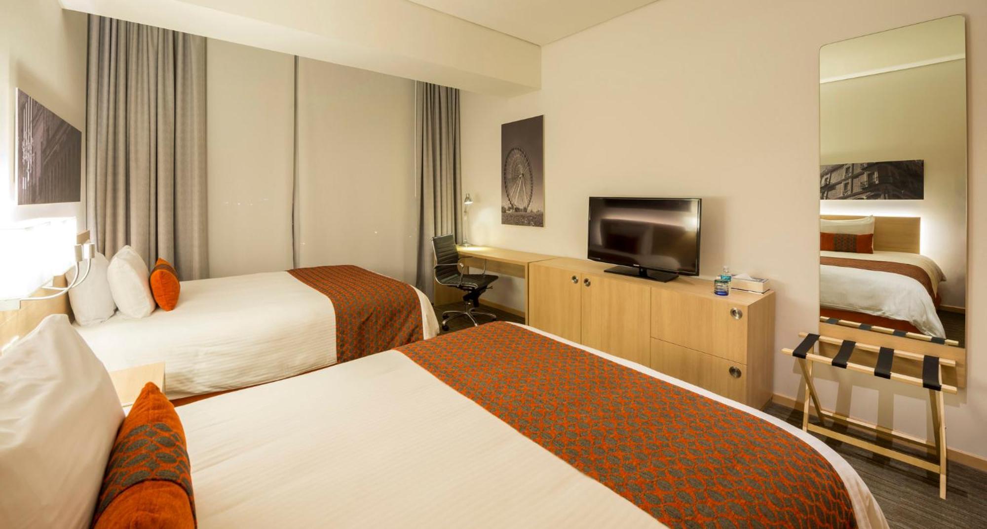 Отель Camino Real Puebla Angelopolis Экстерьер фото A room at the hotel